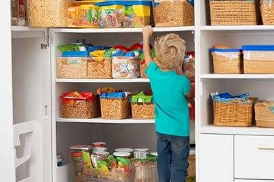 kid in a pantry